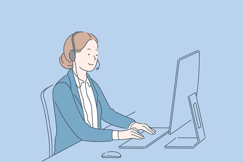 A woman taking a call in a call center.